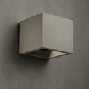 applique cubica in cemento grigio luce su e giù da parete