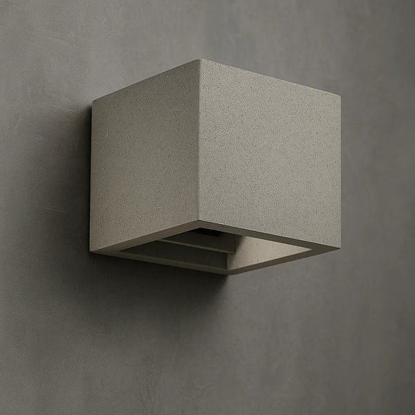 applique cubica in cemento grigio luce su e giù da parete