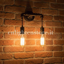 applique amarcord 2 luci in metallo ruggine corten bronzato con design effetto tubi idraulici
