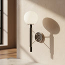 applique moderna in metallo cromato e nero con diffusore sferico in vetro bianco opale attacco E14