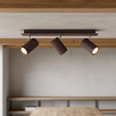 Barra spot ruggine per ambiente rustico moderno con luce orientabile e design compatto in metallo