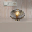 Lampada decorativa Normy su comodino moderno