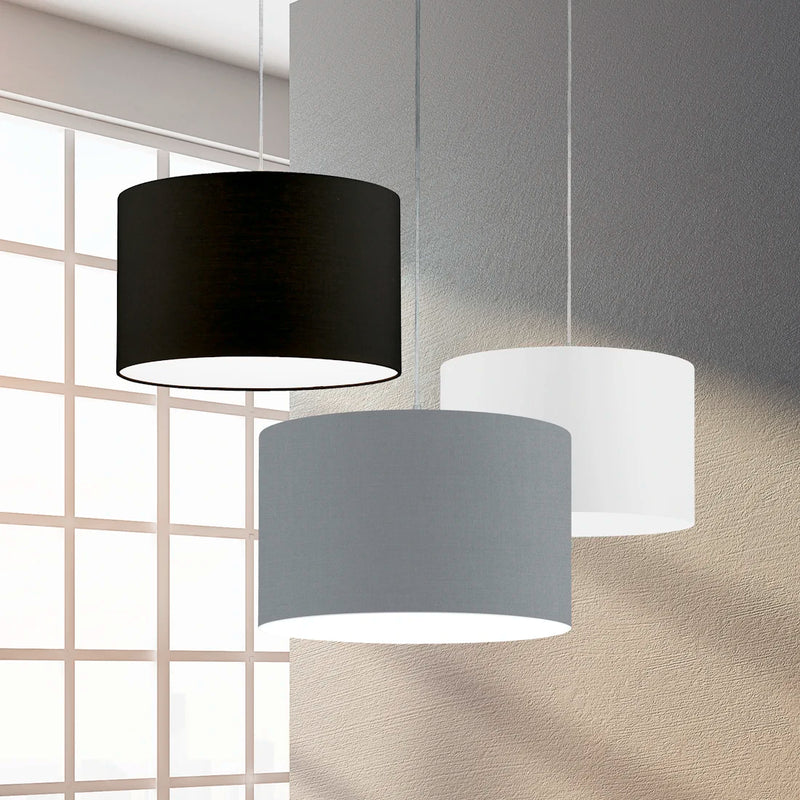 Lampadari con paralume in tessuto vari colori ambientati in una cucina moderna