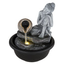 Fontana Buddha da tavolo con anfora grigia e cascata illuminata per creare un angolo zen in casa