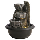 Fontana decorativa con luce calda e scorrimento acqua per creare un angolo relax in casa