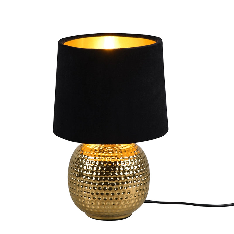 Lampada da tavolo in ceramica dorata effetto martellato con paralume nero e oro