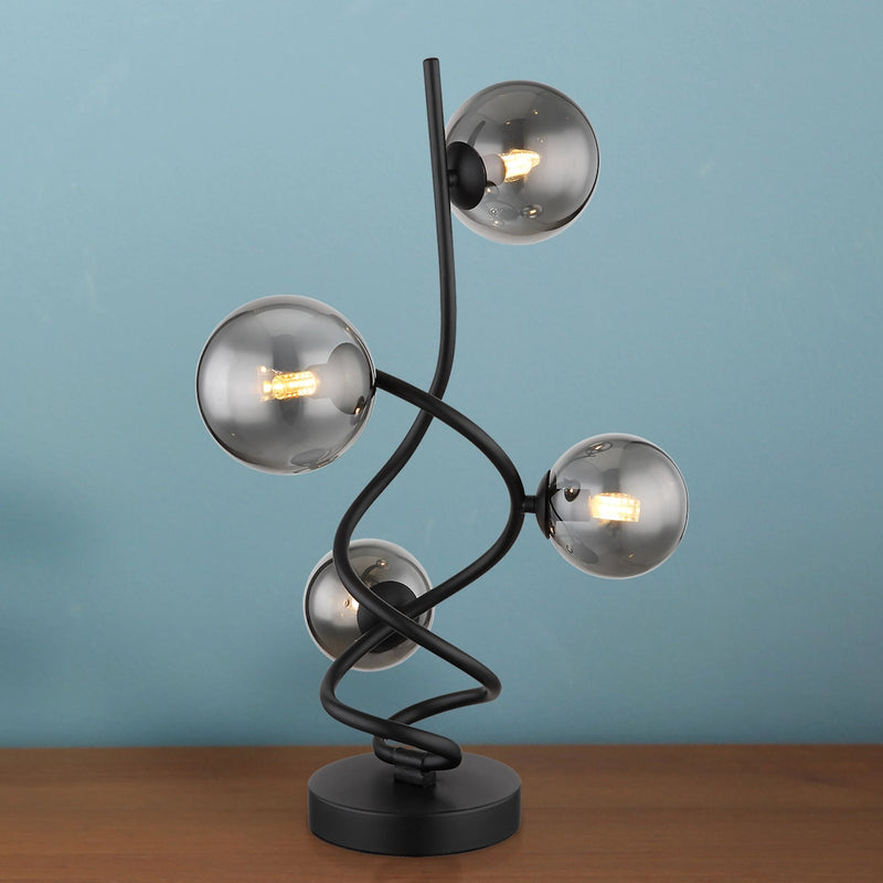 lampada da tavolo riha in metallo nero a spirale con sfere in vetro fume