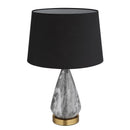 Lampada in metallo color ottone opaco con base bombata effetto marmo e paralume nero in tessuto