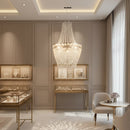 Lampadario a sospensione con struttura cromata e dettagli in cristallo acrilico