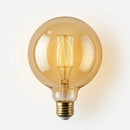 Lampadina LED E27 Globo G125 vintage da 8W e 806 lumen, con vetro ambrato, filamenti decorativi a vista e luce molto calda 2500K