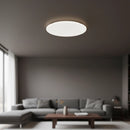 Plafoniera LED Philips Moire che illumina un soggiorno moderno