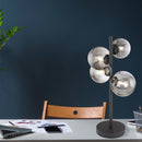 lampada da tavolo con quattro sfere in vetro fumè per soggiorno e studio