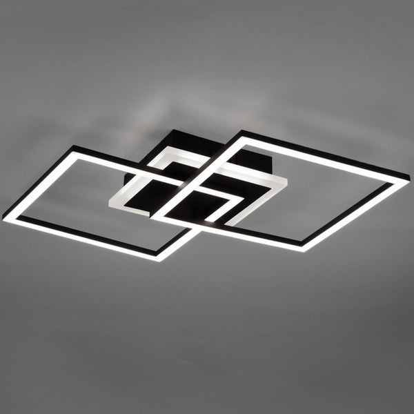 Plafoniera LED moderna da soffitto con quadrati luminosi e luce calda.